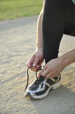 Why is it important to wear proper shoes when working out?